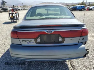 2000 Ford Contour SE Fleet z VIN 1FAFP66L8YK104588, wystawiony jako Copart lot #71769314 z przebiegiem 106 163 mil mil oraz Szkody całkowita. Historia ofert i sprzedaży dostępna na DreamBid. Obrazek 6.