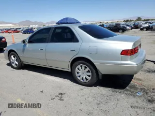 2000 Toyota Camry CE with VIN JT2BG22KXY0492183, listed as a Copart auction lot 52596705 with 181,840 mi miles and Salvage Title. Bid and sale history available at carsss.com. Image 2.
