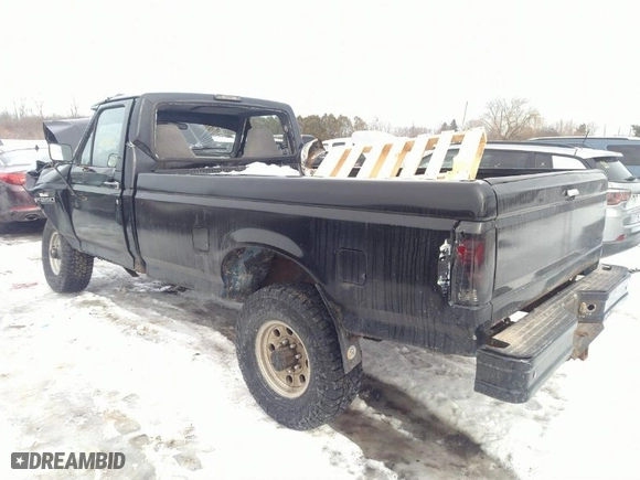 1997 Ford F-250 HD with VIN 1FTHF26F1VEA71176, listed as a IAAI auction lot 41595509 with 136,046 mi miles. Bid and sale history available at carsss.com. Image 3.