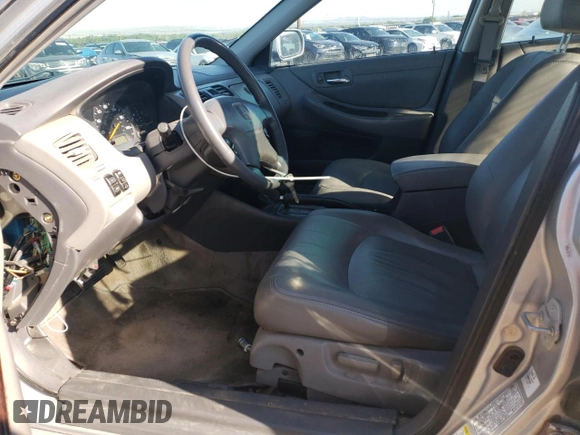 2002 Honda Accord EX z VIN 1HGCG16572A069123, wystawiony jako Copart lot #55861375 z przebiegiem 117 455 mil mil oraz Szkoda całkowita • Salvage title. Historia ofert i sprzedaży dostępna na DreamBid. Obrazek 7.