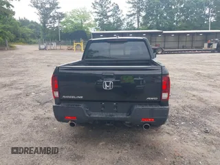 2023 Honda Ridgeline RTL-E with VIN 5FPYK3F77PB052828, listed as a IAAI auction lot 42366947 with 24,658 mi miles and . Bid and sale history available at DreamBid. Image 16.