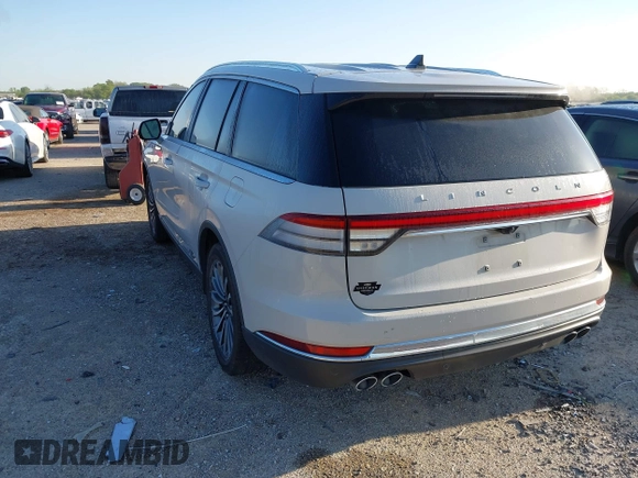 2021 Lincoln Aviator Reserve with VIN 5LM5J7XC5MGL02577, listed as a IAAI auction lot 41944356 with 68,941 mi miles and . Bid and sale history available at DreamBid. Image 3.