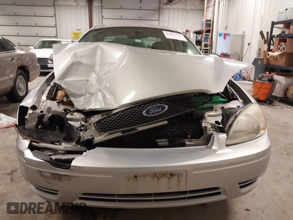 2007 Ford Taurus SEL with VIN 1FAFP56U67A104161, listed as a IAAI auction lot 41885584 with 98,919 mi miles and . Bid and sale history available at DreamBid. Image 13.