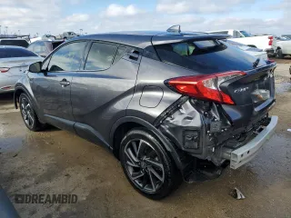 2021 Toyota C-HR LE z VIN JTNKHMBX0M1115552, wystawiony jako Copart lot #37291024 z przebiegiem 50 677 mil mil oraz Szkoda całkowita • Salvage title. Historia ofert i sprzedaży dostępna na DreamBid. Obrazek 2.