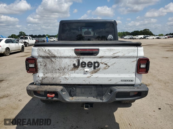 2020 Jeep Gladiator Sport S z VIN 1C6JJTAG3LL215977, wystawiony jako Copart lot #55012635 z przebiegiem Nie podano mil oraz Szkoda całkowita • Salvage title. Historia ofert i sprzedaży dostępna na DreamBid. Obrazek 6.
