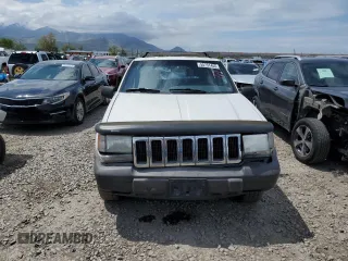 1998 Jeep Grand Cherokee Laredo with VIN 1J4GZ58S4WC244954, listed as a Copart auction lot 55731465 with 205,766 mi miles and Salvage title. Bid and sale history available at DreamBid. Image 5.