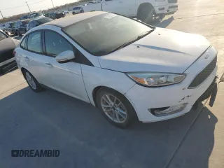 2015 Ford Focus SE с VIN 1FADP3F21FL263604, выставлен на аукционе Copart как лот 82762124 с пробегом 97 298 миль миль и Чистый • Clean title. История ставок и продаж доступна на DreamBid. Изображение 4.