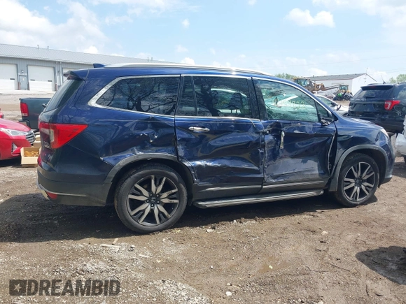 2019 Honda Pilot Touring 7-Passenger z VIN 5FNYF6H63KB000365, wystawiony jako IAAI lot #42154822 z przebiegiem 238 032 mil mil oraz . Historia ofert i sprzedaży dostępna na DreamBid. Obrazek 14.