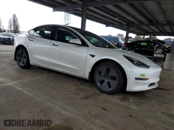 2023 Tesla Model 3 with VIN 5YJ3E1EA7PF488316, listed as a Copart auction lot 49655325 with 60,589 mi miles and Salvage Title. Bid and sale history available at DreamBid. Image 4.