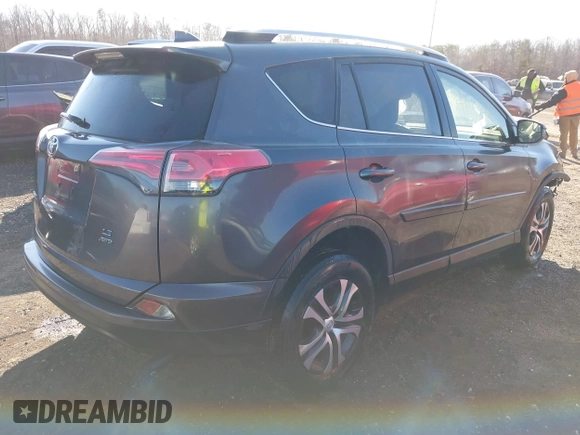2016 Toyota RAV4 LE with VIN JTMBFREV9GJ071041, listed as a IAAI auction lot 41410462 with 57,396 mi miles. Bid and sale history available at carsss.com. Image 4.