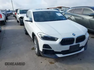 2022 BMW X2 sDrive28i z VIN WBXYH9C06N5U28423, wystawiony jako IAAI lot #42436236 z przebiegiem 77 651 mil mil oraz . Historia ofert i sprzedaży dostępna na DreamBid. Obrazek 1.