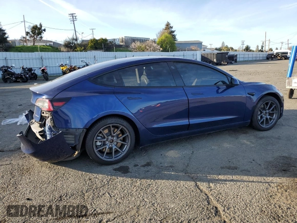 2022 Tesla Model 3 Long Range with VIN 5YJ3E1EB6NF255730, listed as a Copart auction lot 46354235 with 58,470 mi miles and Salvage Title. Bid and sale history available at DreamBid. Image 3.