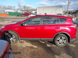 2016 Toyota RAV4 LE with VIN JTMBFREVXGJ100692, listed as a IAAI auction lot 41847333 with 130,822 mi miles. Bid and sale history available at carsss.com. Image 14.