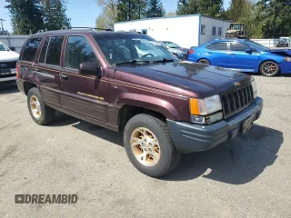 1997 Jeep Grand Cherokee Limited with VIN 1J4GZ78Y7VC727224, listed as a Copart auction lot 53204075 with 79,206 mi miles and Clean title. Bid and sale history available at DreamBid. Image 4.
