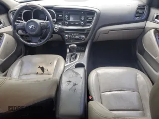 2015 Kia Optima EX z VIN 5XXGN4A70FG425339, wystawiony jako Copart lot #58744265 z przebiegiem 167 716 mil mil oraz Czysty tytuł • Clean title. Historia ofert i sprzedaży dostępna na DreamBid. Obrazek 8.