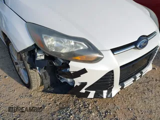 2013 Ford Focus Titanium with VIN 1FADP3J22DL167324, listed as a IAAI auction lot 41616927 with 127,259 mi miles and . Bid and sale history available at carsss.com. Image 6.