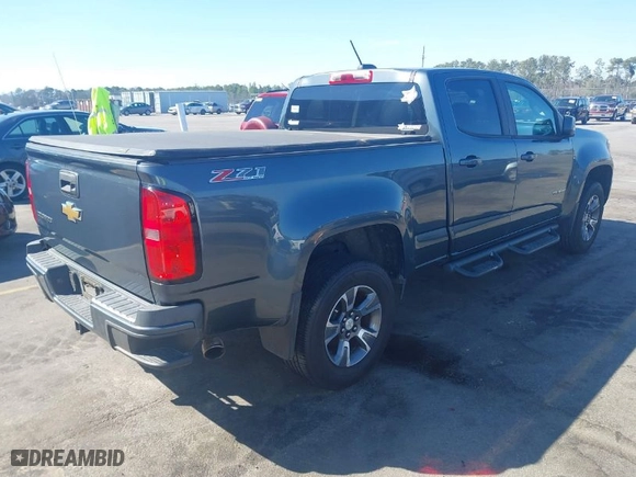 2015 Chevrolet Colorado 4WD Z71 with VIN 1GCGTCE30F1171294, listed as a IAAI auction lot 41655167 with 197,888 mi miles. Bid and sale history available at carsss.com. Image 4.