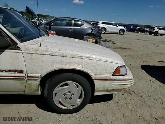 1992 Chevrolet Cavalier RS with VIN 1G1JC5440N7153586, listed as a Copart auction lot 56928094 with 115,451 mi miles and Salvage Title. Bid and sale history available at carsss.com. Image 10.