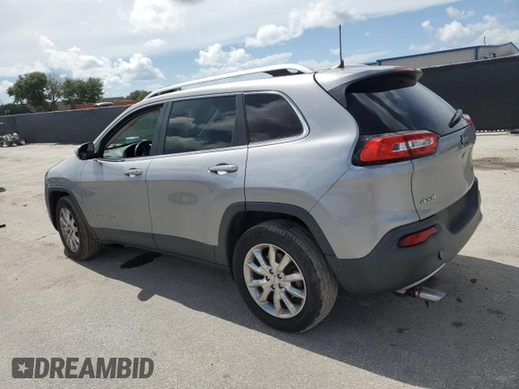 2016 Jeep Cherokee Limited with VIN 1C4PJMDB5GW244734, listed as a Copart auction lot 64608765 with 166,953 mi miles and Salvage title. Bid and sale history available at DreamBid. Image 2.