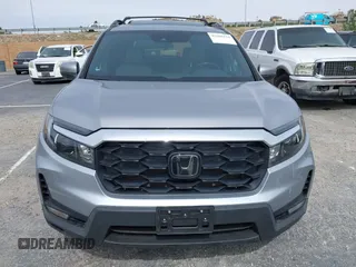 2023 Honda Passport EX-L with VIN 5FNYF8H53PB034963, listed as a IAAI auction lot 41686154 with 12,572 mi miles and . Bid and sale history available at carsss.com. Image 12.