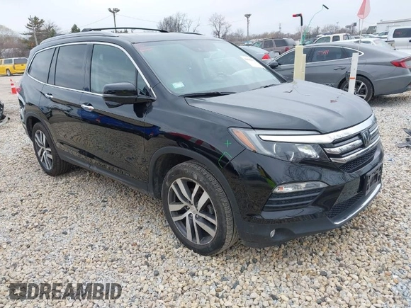 2017 Honda Pilot Touring with VIN 5FNYF6H90HB051700, listed as a IAAI auction lot 41902075 with 69,712 mi miles. Bid and sale history available at carsss.com. Image 1.