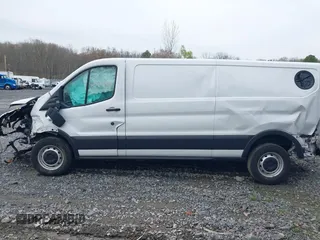 2020 Ford Transit Cargo with VIN 1FTYE1Y86LKA08570, listed as a IAAI auction lot 41571478 with 21,405 mi miles and . Bid and sale history available at DreamBid. Image 14.