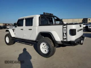 2022 Jeep Gladiator Rubicon with VIN 1C6JJTBG5NL152818, listed as a Copart auction lot 80095554 with 9,579 mi miles and Salvage title. Bid and sale history available at DreamBid. Image 2.