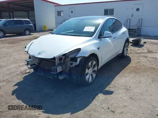 2021 Tesla Model Y Long Range with VIN 5YJYGDEE4MF122362, listed as a IAAI auction lot 42096138 with 47,006 mi miles and . Bid and sale history available at DreamBid. Image 2.
