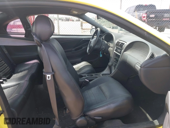 2003 Ford Mustang GT Deluxe z VIN 1FAFP42X43F394679, wystawiony jako IAAI lot #42129223 z przebiegiem 135 472 mil mil oraz . Historia ofert i sprzedaży dostępna na DreamBid. Obrazek 5.