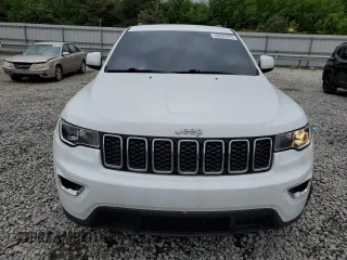 2021 Jeep Grand Cherokee Laredo E with VIN 1C4RJEAG4MC548990, listed as a Copart auction lot 55638235 with 54,771 mi miles and Salvage title. Bid and sale history available at DreamBid. Image 5.
