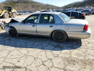 2005 Ford Crown Victoria LX with VIN 2FAFP74W85X121659, listed as a Copart auction lot 44399655 with 145,525 mi miles and Salvage Title. Bid and sale history available at carsss.com. Image 2.