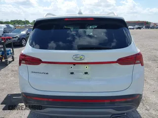2023 Hyundai Santa Fe SEL z VIN 5NMS24AJ3PH656978, wystawiony jako IAAI lot #42172853 z przebiegiem 9 436 mil mil oraz . Historia ofert i sprzedaży dostępna na DreamBid. Obrazek 16.