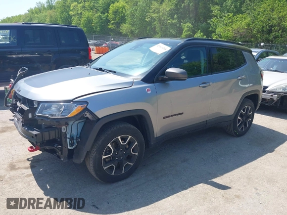 2021 Jeep Compass Trailhawk z VIN 3C4NJDDB7MT590390, wystawiony jako IAAI lot #42163205 z przebiegiem 70 551 mil mil oraz . Historia ofert i sprzedaży dostępna na DreamBid. Obrazek 2.
