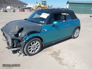 2016 MINI Cooper Convertible with VIN WMWWG5C53G3C18842, listed as a IAAI auction lot 41864596 with 91,253 mi miles. Bid and sale history available at carsss.com. Image 17.