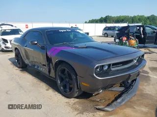 2014 Dodge Challenger R/T с VIN 2C3CDYBT8EH274089, выставлен на аукционе IAAI как лот 42392332 с пробегом 150 254 миль миль и . История ставок и продаж доступна на DreamBid. Изображение 6.