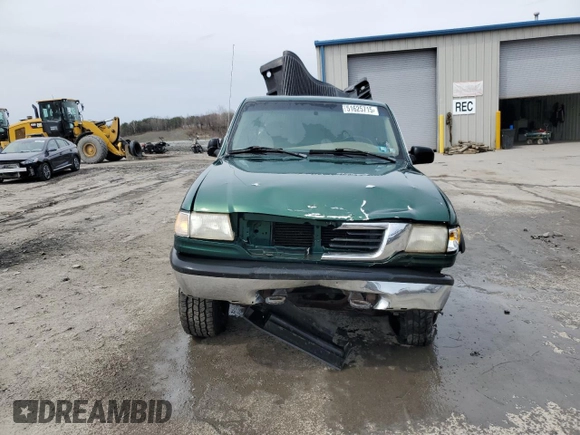 1999 Mazda B-Series Truck SE with VIN 4F4ZR17X2XTM25631, listed as a Copart auction lot 51625715 with 204,134 mi miles and Salvage Title. Bid and sale history available at DreamBid. Image 5.