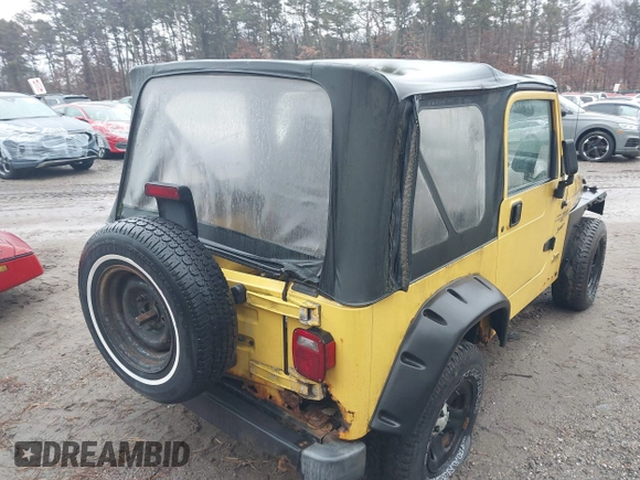 2000 Jeep Wrangler Sport with VIN 1J4FA49S4YP763414, listed as a IAAI auction lot 41478005 with 222,012 mi miles and . Bid and sale history available at DreamBid. Image 4.