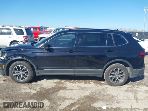 2020 Volkswagen Tiguan SE with VIN 3VV3B7AX0LM106561, listed as a IAAI auction lot 41712689 with 85,374 mi miles and . Bid and sale history available at DreamBid. Image 15.