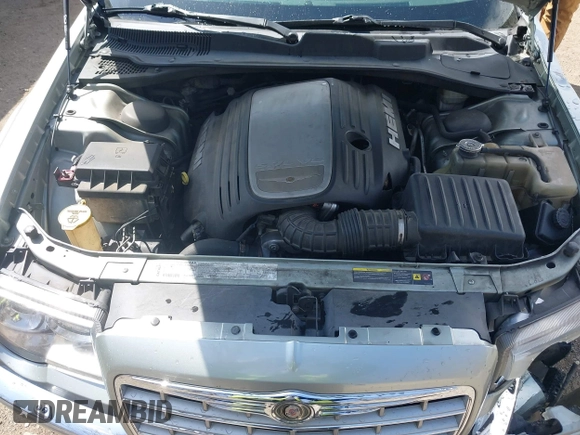 2006 Chrysler 300 C with VIN 2C3LA63H06H105774, listed as a IAAI auction lot 41918634 with 319,232 mi miles. Bid and sale history available at carsss.com. Image 10.