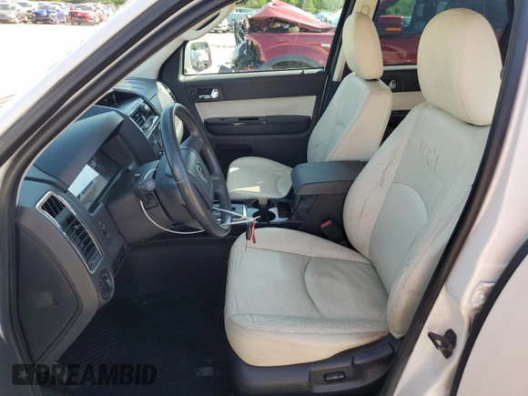 2009 Mercury Mariner Premier z VIN 4M2CU87G19KJ11476, wystawiony jako Copart lot #61718784 z przebiegiem 117 526 mil mil oraz Szkody całkowita. Historia ofert i sprzedaży dostępna na DreamBid. Obrazek 7.