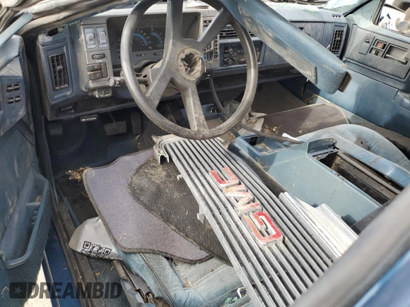 1994 GMC Jimmy SL z VIN 1GKCS13WXR0532905, wystawiony jako Copart lot #60670404 z przebiegiem 116 002 mil mil oraz Nie do naprawy. Historia ofert i sprzedaży dostępna na DreamBid. Obrazek 8.