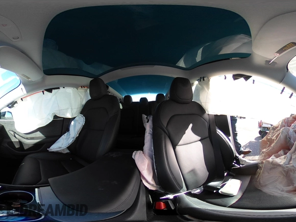 2025 Tesla Model 3 Long Range with VIN 5YJ3E1EB5SF877778, listed as a IAAI auction lot 41639595 with 8,295 mi miles and . Bid and sale history available at DreamBid. Image 17.