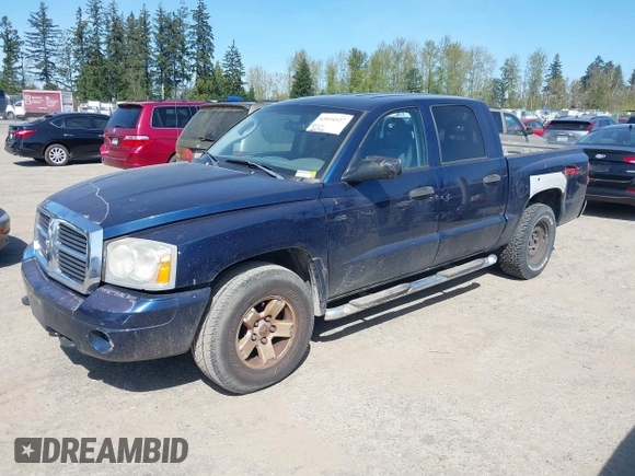 2006 Dodge Dakota SLT z VIN 1D7HW48NX6S708140, wystawiony jako IAAI lot #42054527 z przebiegiem 226 944 mil mil oraz . Historia ofert i sprzedaży dostępna na DreamBid. Obrazek 2.