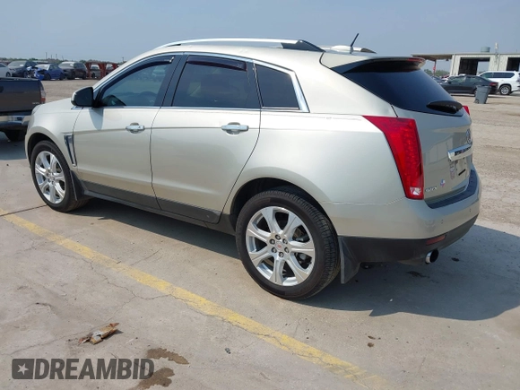2015 Cadillac SRX Premium Collection with VIN 3GYFNDE38FS561936, listed as a IAAI auction lot 42266801 with 64,820 mi miles and . Bid and sale history available at DreamBid. Image 3.