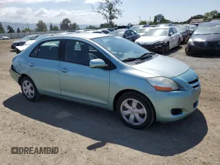 2008 Toyota Yaris with VIN JTDBT923481241884, listed as a Copart auction lot 54702185 with 82,053 mi miles and Salvage Title. Bid and sale history available at DreamBid. Image 4.