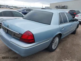 2010 Mercury Grand Marquis LS with VIN 2MEBM7FV0AX613519, listed as a IAAI auction lot 41582646 with 201,854 mi miles. Bid and sale history available at carsss.com. Image 4.