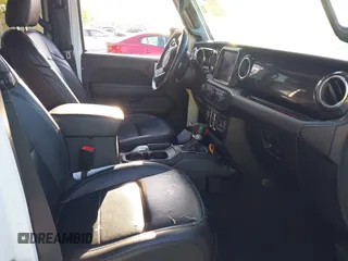 2020 Jeep Wrangler Unlimited Sahara High Altitude with VIN 1C4HJXEG7LW259911, listed as a IAAI auction lot 41786013 with 47,936 mi miles and . Bid and sale history available at DreamBid. Image 5.