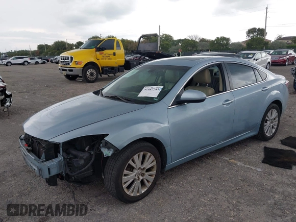 2009 Mazda 6 i Touring with VIN 1YVHP82AX95M19535, listed as a IAAI auction lot 41987285 with 129,111 mi miles and . Bid and sale history available at carsss.com. Image 2.