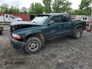 2000 Dodge Dakota Sport z VIN 1B7GG2AN9YS777289, wystawiony jako Copart lot #55776625 z przebiegiem 192 139 mil mil oraz Szkoda całkowita • Salvage title. Historia ofert i sprzedaży dostępna na DreamBid. Obrazek 1.