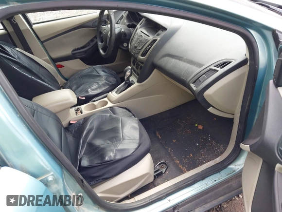 2012 Ford Focus SE with VIN 1FAHP3F25CL261609, listed as a IAAI auction lot 42517968 with 169,109 mi miles and . Bid and sale history available at DreamBid. Image 5.